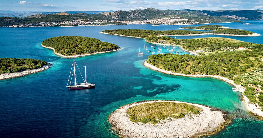 Aerial view of lush Pakleni Islands surrounded by turquoise sea.